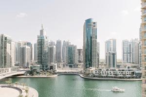 a view of a city with a river and buildings at Boutique Living - Park Island in Dubai
