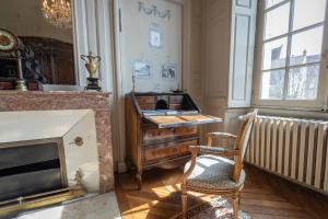 Posezení v ubytování L'Hotel de Panette, Un exceptionnel château en coeur de ville