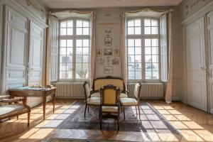 Posezení v ubytování L'Hotel de Panette, Un exceptionnel château en coeur de ville