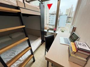 Postel nebo postele na pokoji v ubytování Formosa 101 Taipei Main Branch