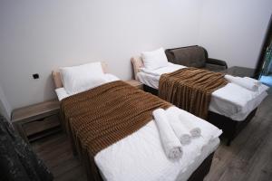 Ένα ή περισσότερα κρεβάτια σε δωμάτιο στο VN Hotel Vanadzor