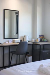 Postel nebo postele na pokoji v ubytování Yello Block Hotel