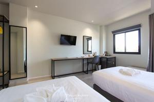 Postel nebo postele na pokoji v ubytování Yello Block Hotel
