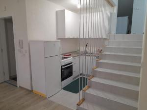 Kuchyň nebo kuchyňský kout v ubytování Apartman Rešidović