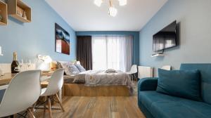 TV a/nebo společenská místnost v ubytování New Gudauri Loft 2 Apartments