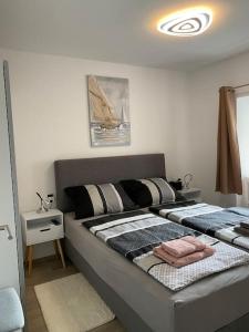 Postel nebo postele na pokoji v ubytování Apartment MM22