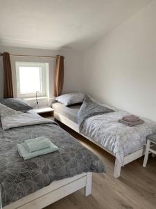 Posteľ alebo postele v izbe v ubytovaní Apartment MM22