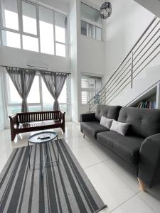 Posezení v ubytování Yenni Duplex @ DeCentrum, Kajang