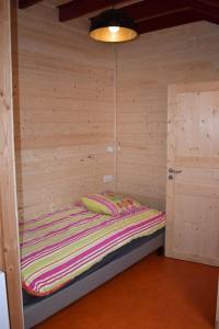 Posteľ alebo postele v izbe v ubytovaní Gîte de Montagne "Les Ecorces"