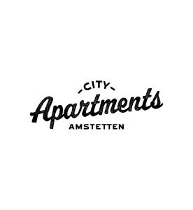 znak, który czyta miejskie apartamenty superstar w obiekcie City Apartments Amstetten w mieście Amstetten