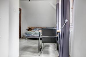 Fotografia z galérie ubytovania Willa pod Zegarem - w cenie Parking, szybkie Wifi, duzy ogrod, wiata grilowa! v Krynici-Zdrój
