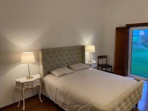 A bed or beds in a room at Casa Bendi
