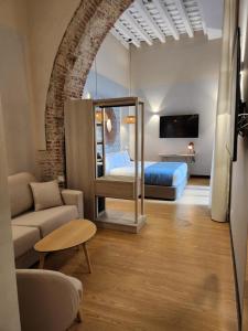 מיטה או מיטות בחדר ב-Soho Boutique Cádiz