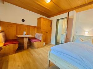 Postel nebo postele na pokoji v ubytování Gästehaus Sonnleit`n