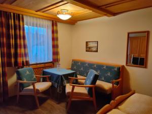 Posezení v ubytování Gästehaus Sonnleit`n
