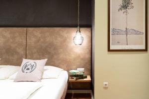 Posteľ alebo postele v izbe v ubytovaní Altstadthotel Kasererbräu