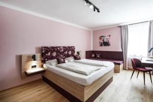Posteľ alebo postele v izbe v ubytovaní Altstadthotel Kasererbräu