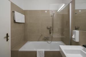 Kúpeľňa v ubytovaní Altstadthotel Kasererbräu