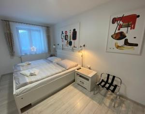 Posteľ alebo postele v izbe v ubytovaní Maliarik – Apartmán Deluxe