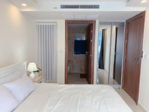 Voodi või voodid majutusasutuse Grand Avenue Pattaya Residence 6floor toas