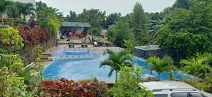 an overhead view of a swimming pool in a yard at Casa de Robles Tanay Rizal in Tanay