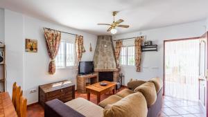 A television and/or entertainment centre at Chalet Algar by Ruralidays