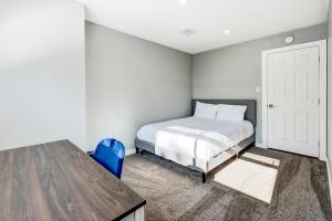 a bedroom with a bed and a table and a door at Incline Village Getaway in Incline Village