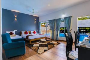 Postel nebo postele na pokoji v ubytování The Spectrum Resort - Chikmagalur + 37 fotografií