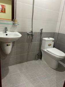 a bathroom with a toilet and a sink at Hoa Sua Hotel in Vung Tau +82 photos