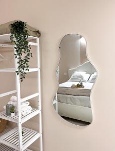 A bed or beds in a room at Fiera Milano City Apartment