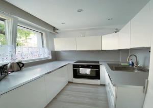 Kuchyň nebo kuchyňský kout v ubytování Apartment im Zentrum Berlin Kudamm, City West