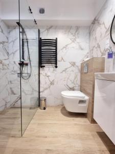 Koupelna v ubytování SunMarine Hel