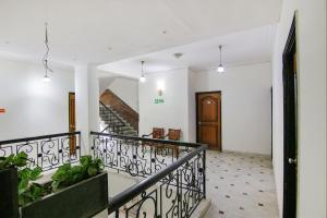 a staircase in a building with a stair case at FabHotel Singh Suite in Gurgaon