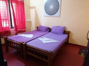 Postel nebo postele na pokoji v ubytování Sukriti beach Resort