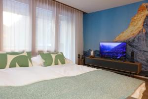 Μια τηλεόραση ή/και κέντρο ψυχαγωγίας στο Casa Cervino 45