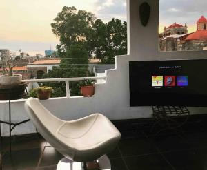 TV a/nebo společenská místnost v ubytování Centerpice Colonial Zone