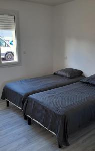 Posteľ alebo postele v izbe v ubytovaní Maison neuve proche de la mer + 1 fotografia