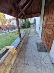 an entrance to a house with a wooden door at Avalon Apartments in Belgrade