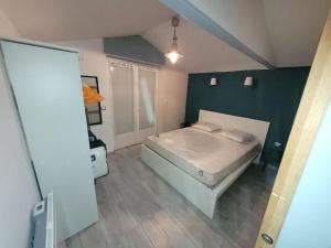 Posteľ alebo postele v izbe v ubytovaní Beau chalet 6 personnes avec Jacuzzi