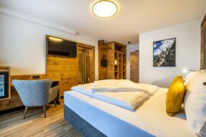 Postel nebo postele na pokoji v ubytování Aparthotel Fuxbau + 37 fotografií