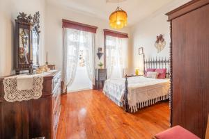 Postel nebo postele na pokoji v ubytování Casa da Celeira