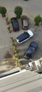 a group of cars parked in a parking lot at Luxury Studio Princess in Casablanca