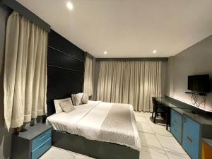 Postel nebo postele na pokoji v ubytování NT Hotels and Resorts Akridha