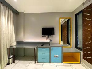 TV a/nebo společenská místnost v ubytování NT Hotels and Resorts Akridha