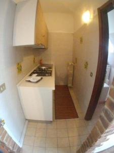 Kuchyň nebo kuchyňský kout v ubytování La casa di Dario