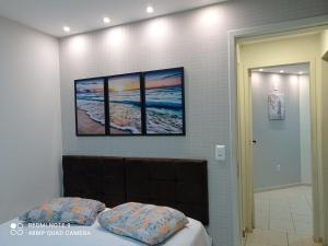 Ein Bett oder Betten in einem Zimmer der Unterkunft Double Beach - Um cantinho inesquecível da Praia do Morro, lugar de tranquilidade e mar calmo