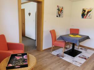 A seating area at Pension Tannheim