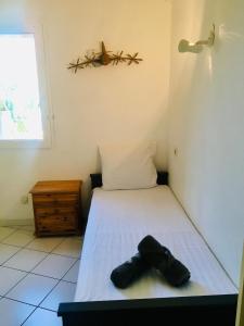 Posteľ alebo postele v izbe v ubytovaní ''Croisette'' Appartement rez de jardin accès direct plage !