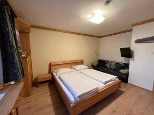 Posteľ alebo postele v izbe v ubytovaní Haus Alpenruhe