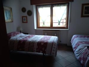 Postel nebo postele na pokoji v ubytování Sunlake lago